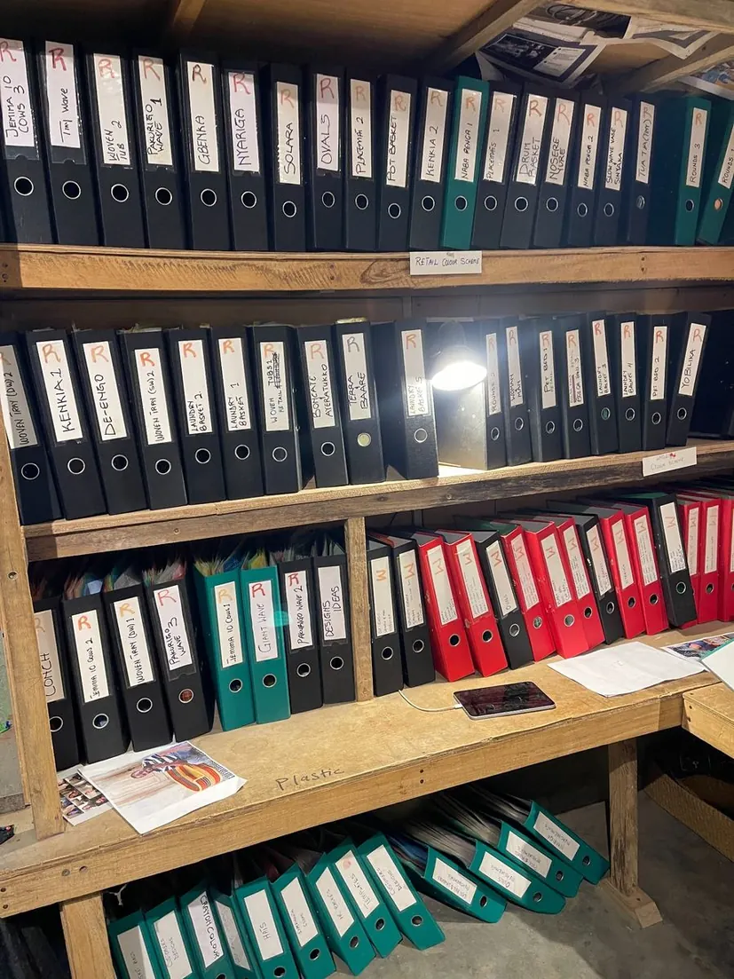 Shelves of basket design and measurement binders in the Baba Tree office