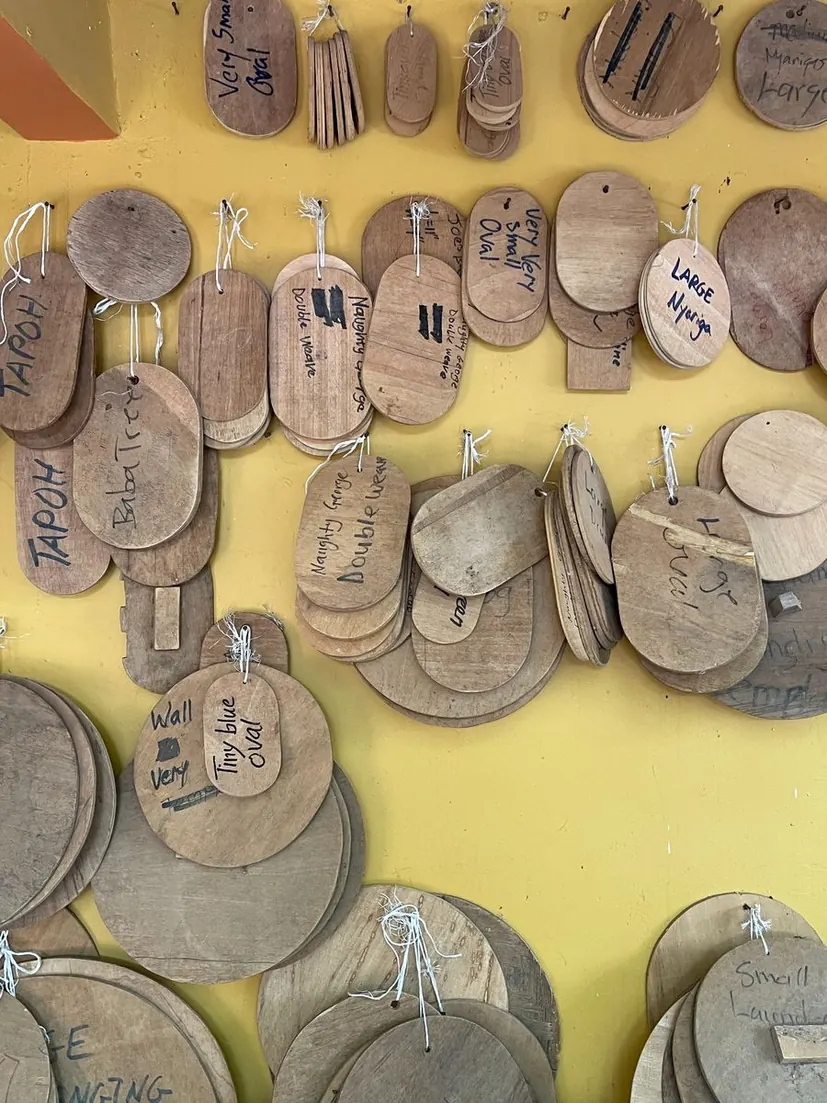 Wooden basket base templates arranged on the wall