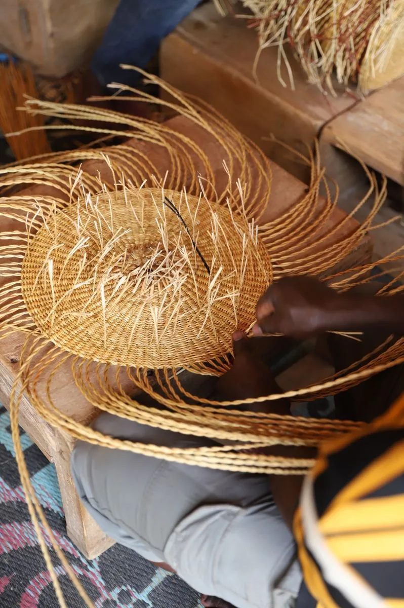 The widening woven base of a basket